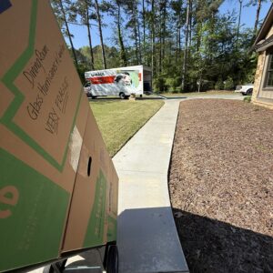 Boxes on handtruck being moved