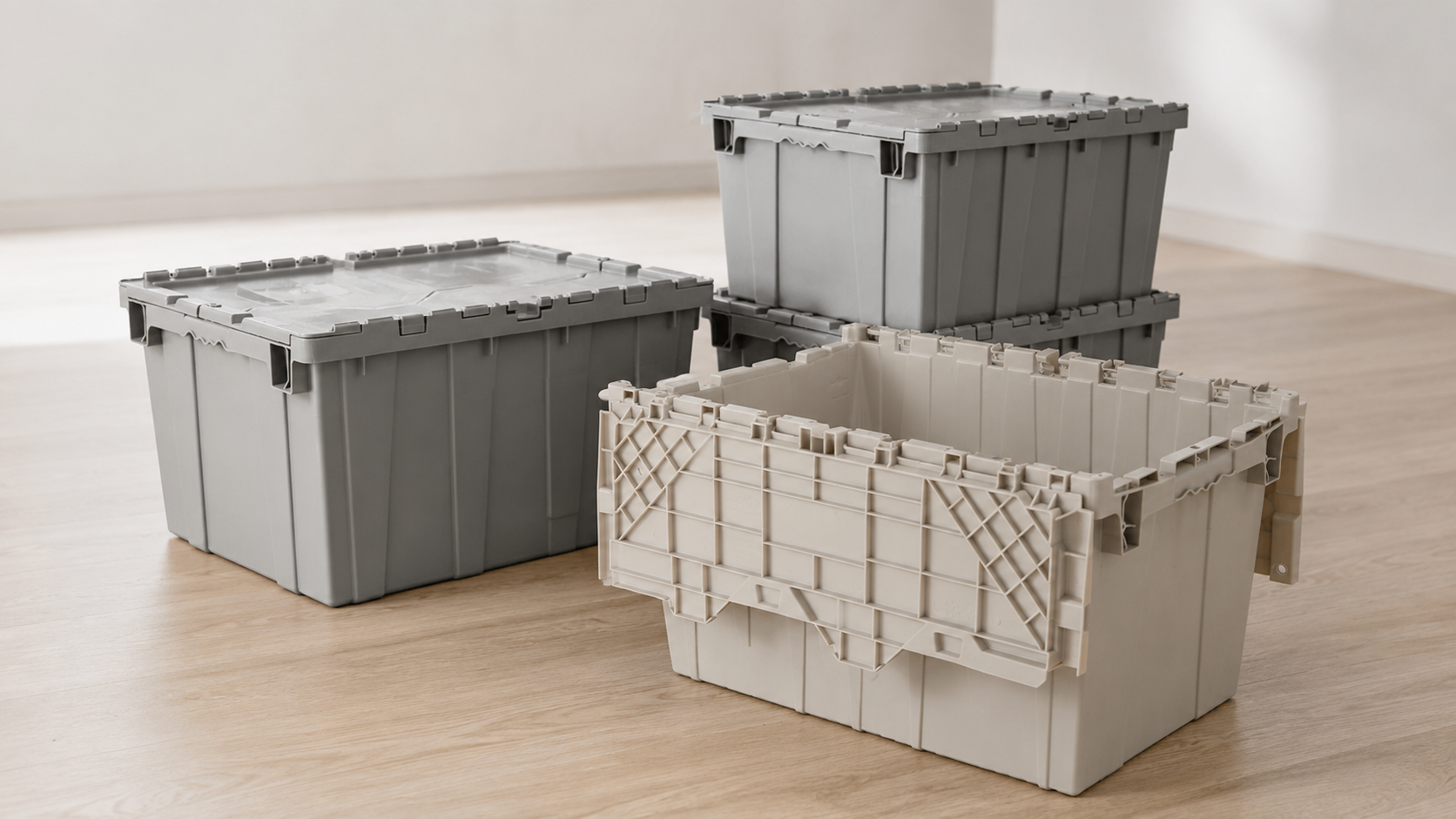 Blue reusable moving boxes stacked with lids